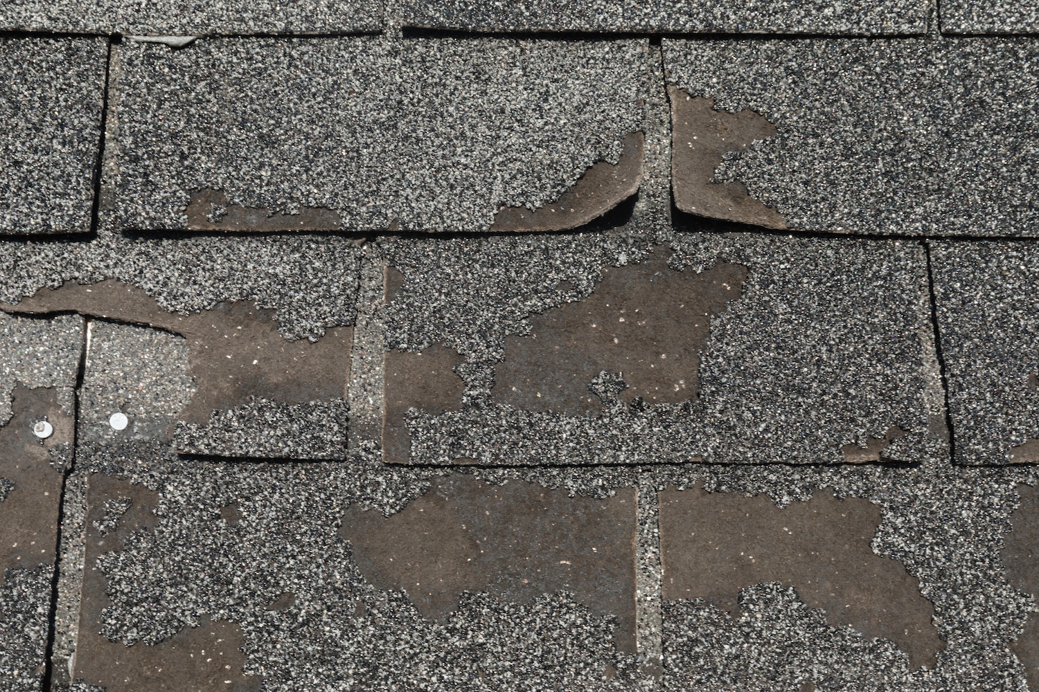 commercial roof maintenance cracked shingles