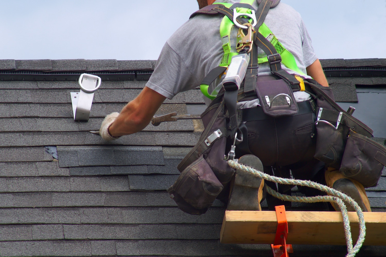 roofing contractors colorado springs roofer removing shingles