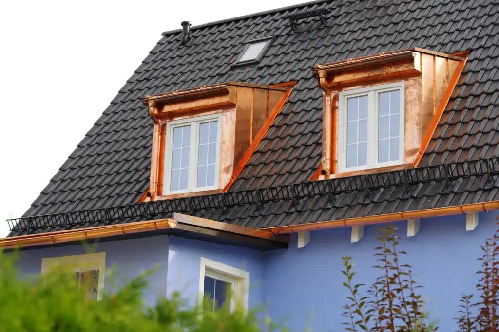 copper roof accents on metal shingle roof