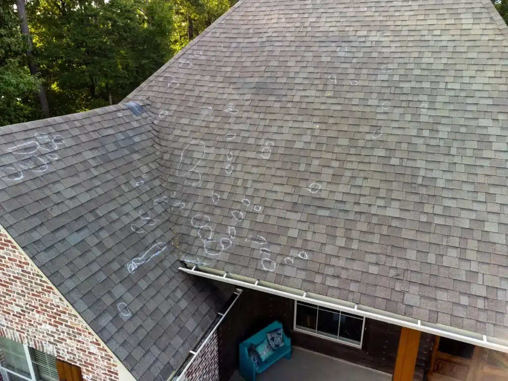 aerial view of roof with storm damage after inspection
