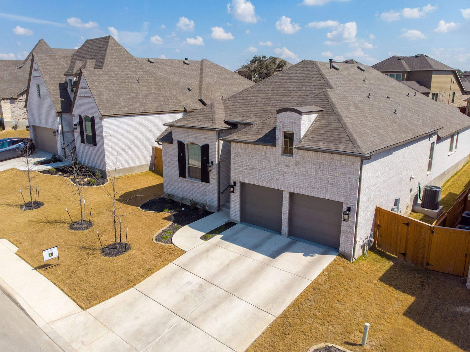 san antonio roofers install new roof in texas neighborhood