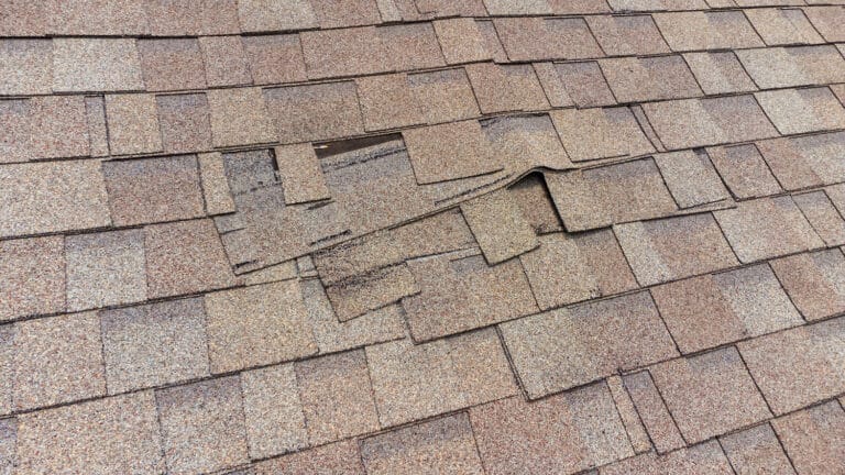 roof damage loose shingles