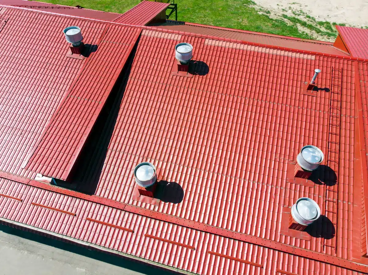 commercial-metal-roof-repair bright red roofs