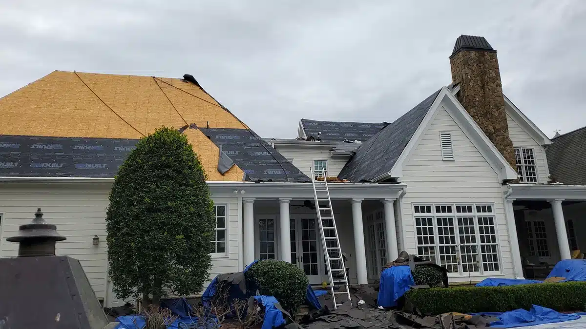 family house with asphalt shingle roof replacement