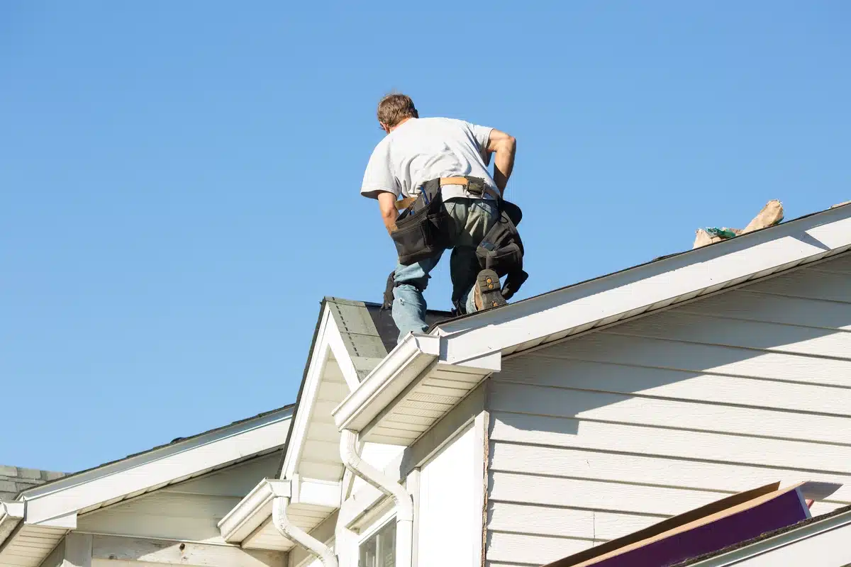 roofer working on shingles
