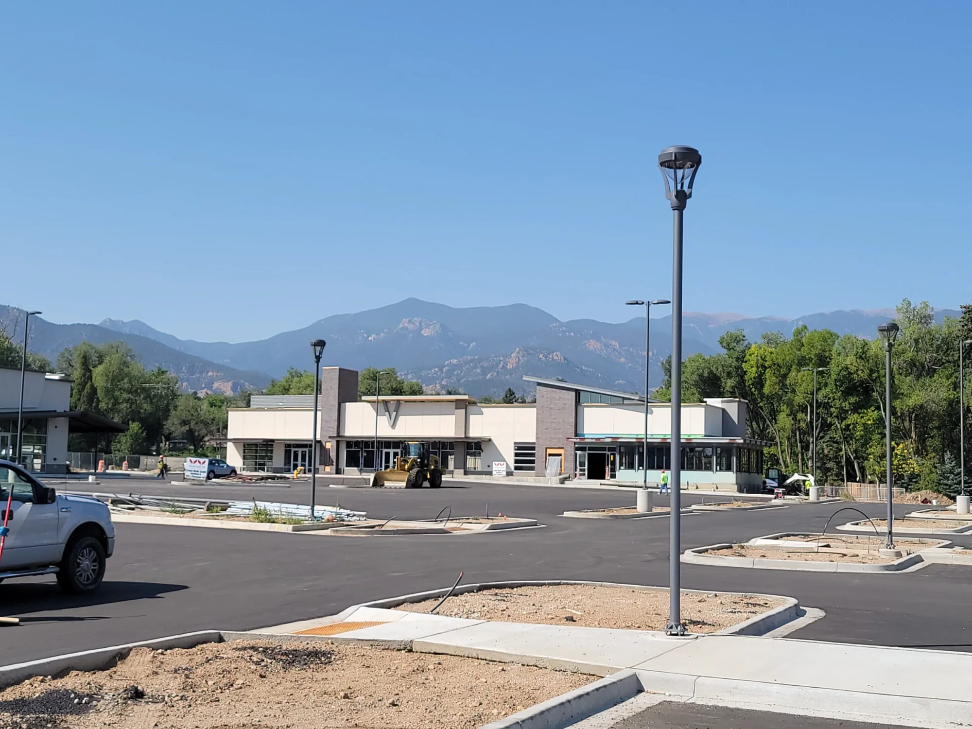 Creekwalk South in Colorado Springs, Colorado — standing seam roofing, paver systems and architectural metal by Tectum Roofing across the 5-building, $1.5M project