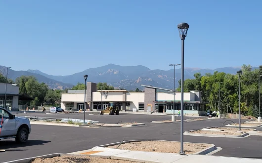 Creekwalk South in Colorado Springs, Colorado — standing seam roofing, paver systems and architectural metal by Tectum Roofing across the 5-building, $1.5M project